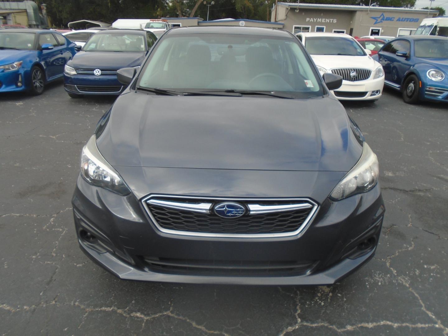 2017 Subaru Impreza 2.0i Premium CVT 4-Door (4S3GKAB65H3) with an 2.0L H4 DOHC 16V engine, CVT transmission, located at 6112 N Florida Avenue, Tampa, FL, 33604, (888) 521-5131, 27.954929, -82.459534 - Photo#5